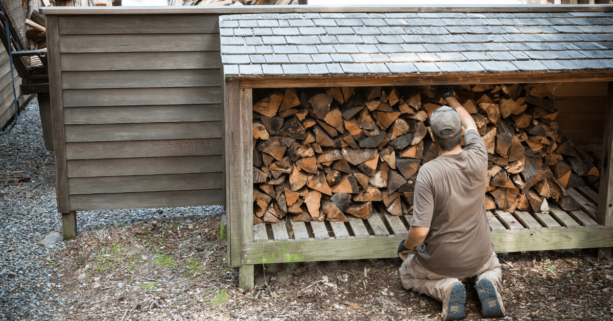A man stacking firewood
